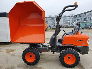 Raddumper - Apken GmbH Orangefarbener Raddumper mit einem geräumigen Kippbett, ideal für den Materialtransport.